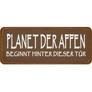 Schild Spruch "Planet der Affen hinter...