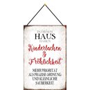 Schild Spruch Kinderlachen und Fröhlichkeit haben...