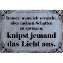 Schild Spruch "Wenn ich über Schatten springe,...