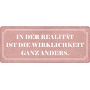 Schild Spruch "In der Realität ist die...