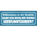 Schild Spruch "Willkommen in der Realität"...